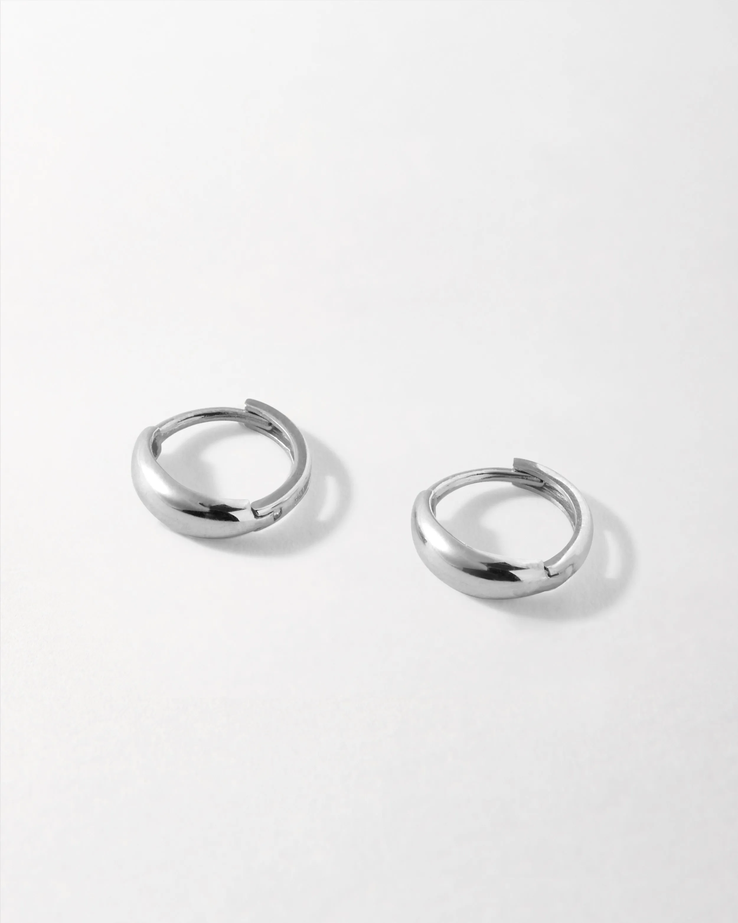 Bold Huggie Earrings - White Gold