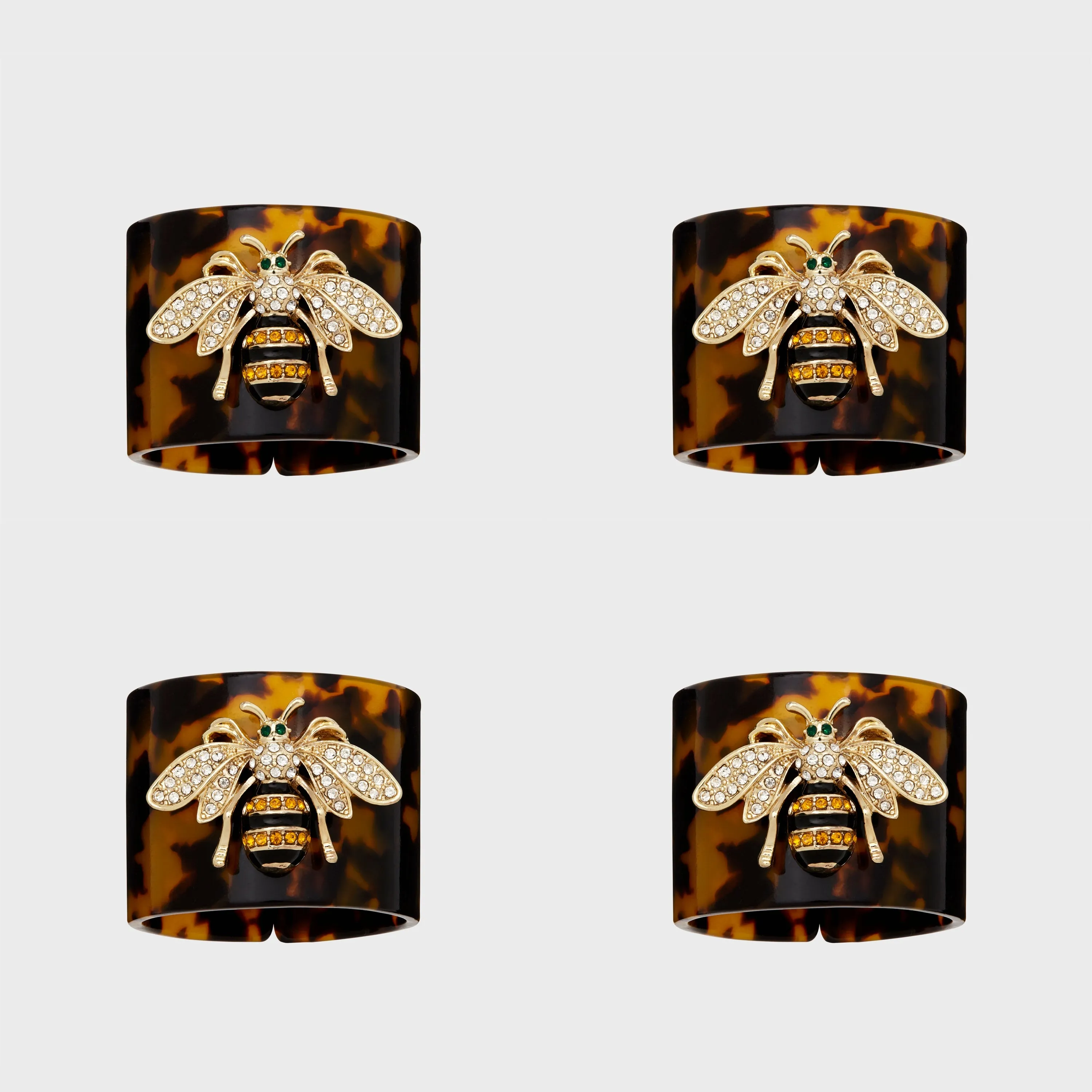 Stripey bee resin napkin rings, tortoiseshell, set of four